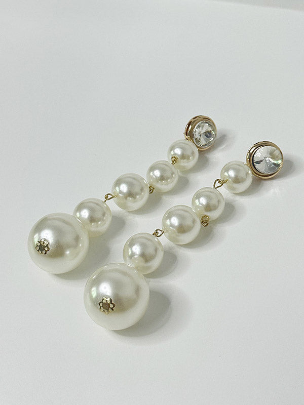 Boucles d'oreilles perlées géométriques brillantes
