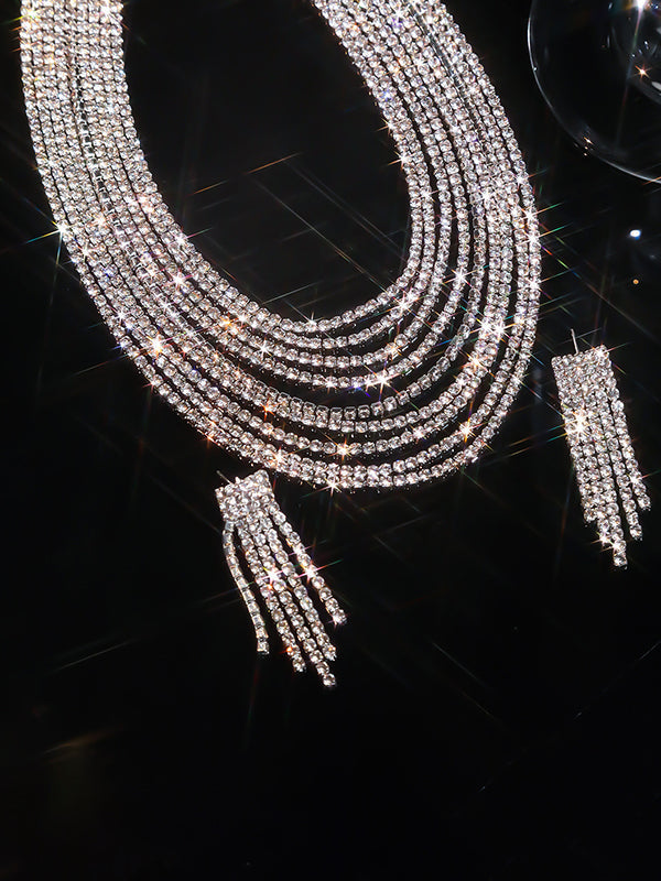 Parure boucles d'oreilles pendantes et collier superposée