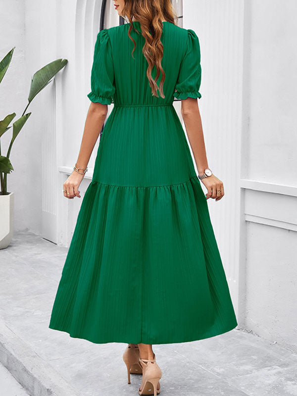 Robe mi-longue plissée coupe trapèze, taille haute, à taille élastique, à empiècements, à col en V, couleur unie