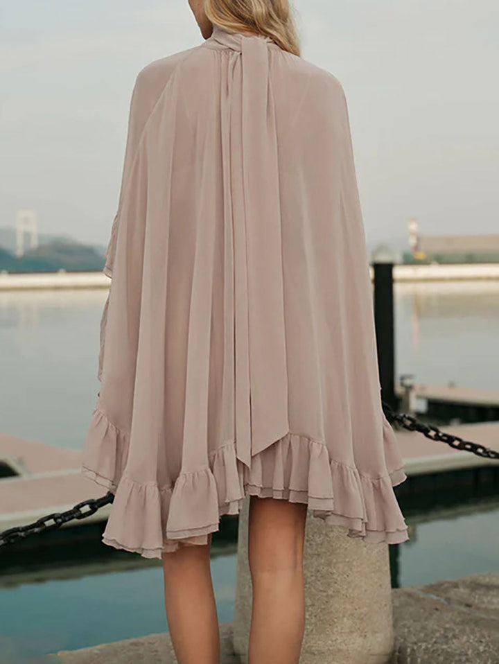 Robe courte ensemble deux pièces plissée volantée nouée taille haute, sans manches, à empiècements, à col cheminée, couleur unie