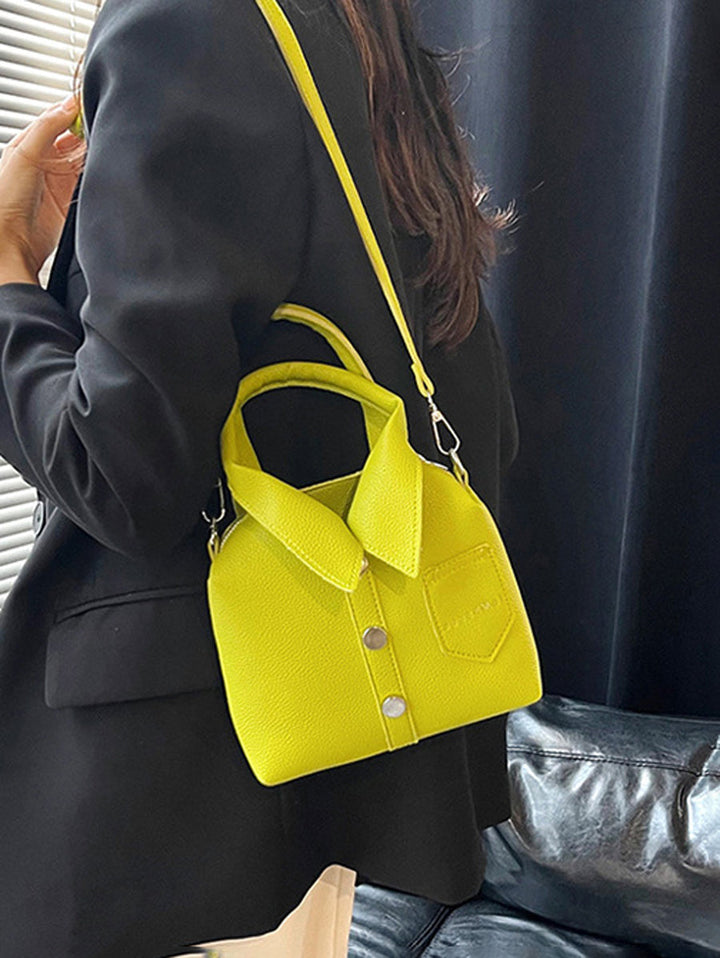 Sac à main bandoulière géométrique boutonné couleur unie