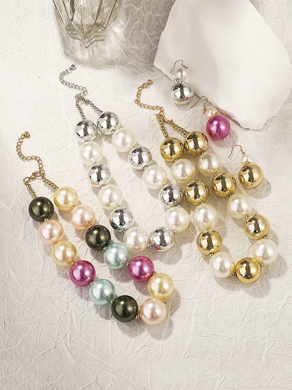 Parure boucles d'oreilles pendantes et collier géométrique couleur contrastée