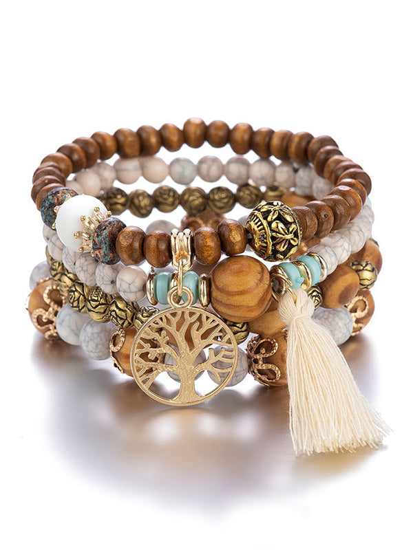 Bracelet bohémien multicouche en perles de bois fait à la main avec pompons