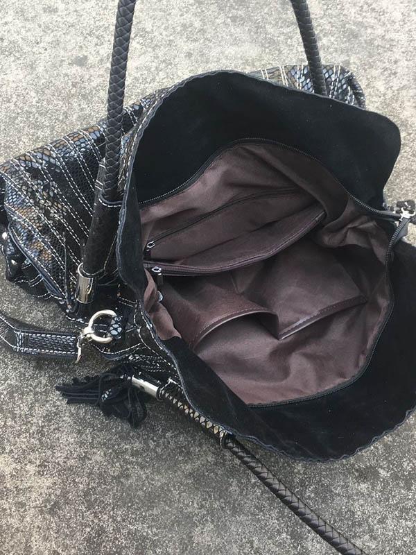 Sac en cuir à bandoulière rayé à empiècements