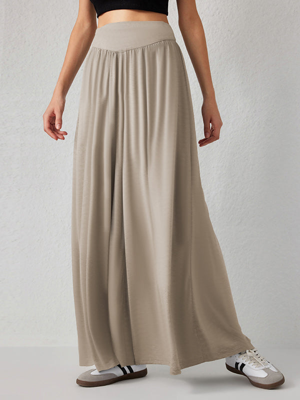 Pantalon ample plissé taille haute, à poches, à empiècements, couleur unie