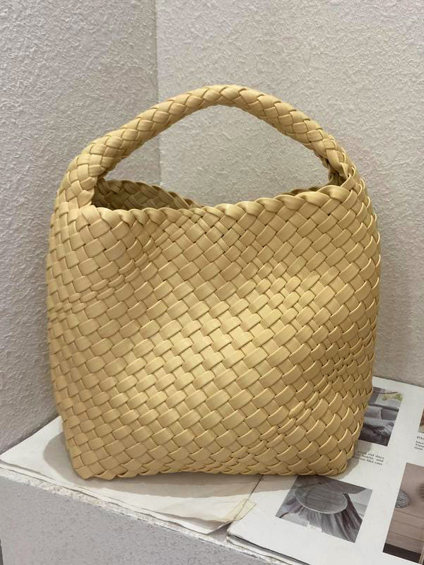 Sac à main tressé couleur unie