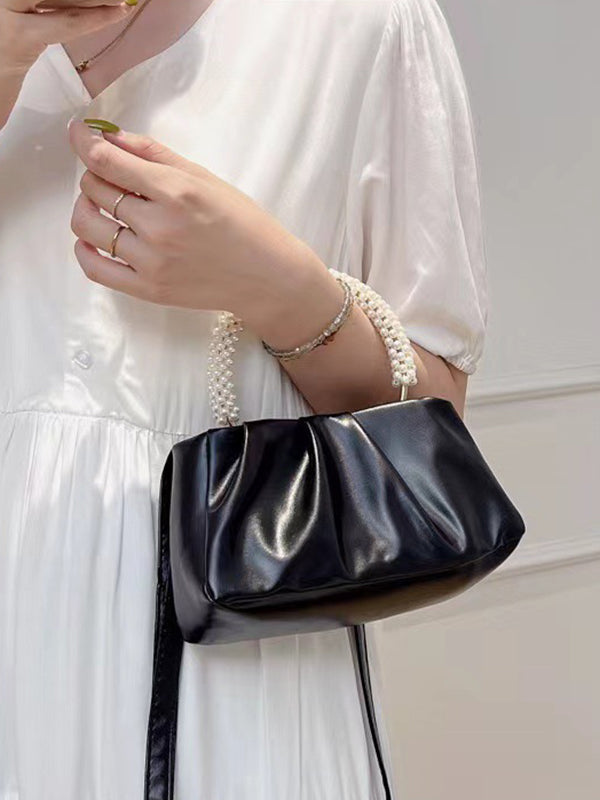 Sac à main perlé à empiècements