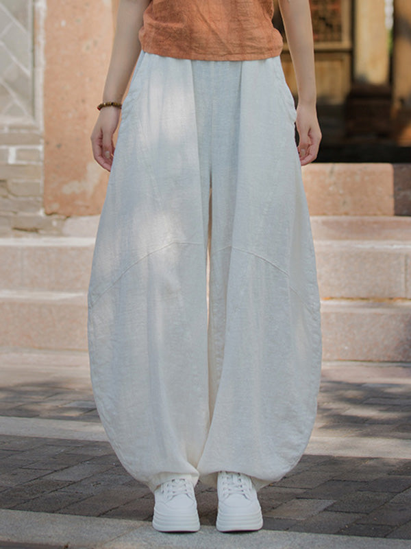 Pantalon ample à taille élastique, à poches, à empiècements, couleur unie