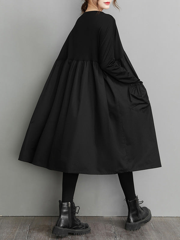 Robe mi-longue simple ample noire à empiècements, à manches longues