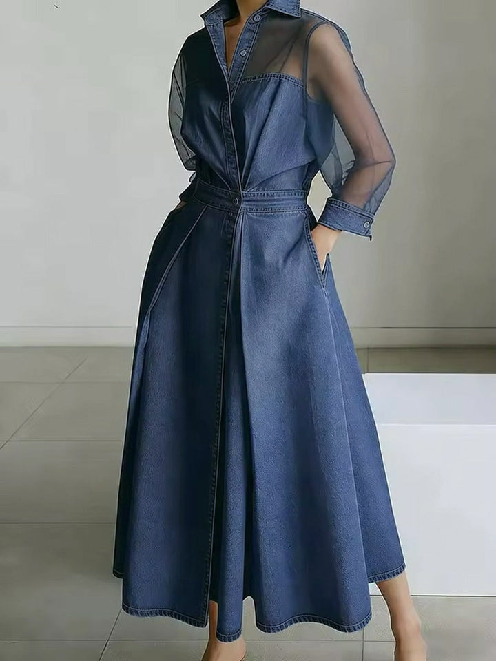 Robe longue boutonnée transparente coupe trapèze, taille haute, à poches, à empiècements, à col revers, couleur unie