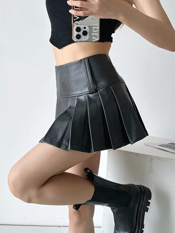 Jupe plissée coupe trapèze, taille haute, couleur unie