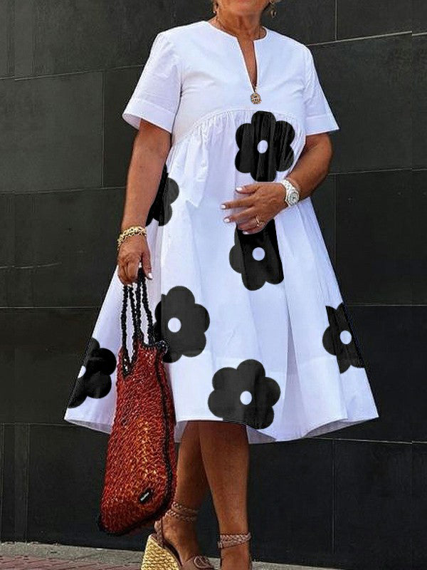 Robe mi-longue ample à manches courtes, à imprimé floral, à col en V