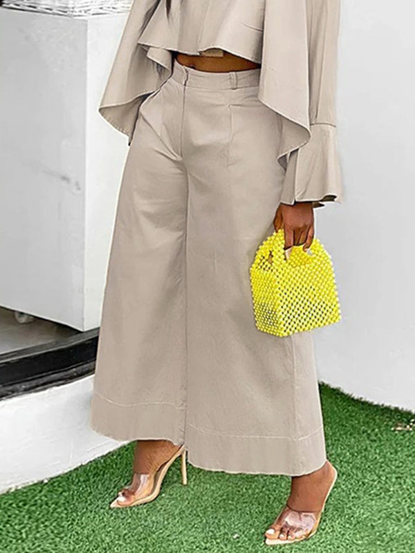 Pantalon à jambes larges, à empiècements, couleur unie
