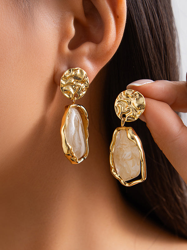 Boucles d'oreilles géométriques brillantes à coupe irrégulière
