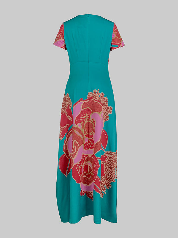 Robe de soirée longue ample coupe trapèze, à imprimé floral, à empiècements, à décolleté en V profond