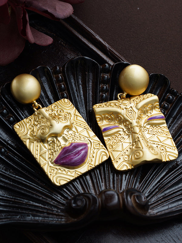 Boucles d'oreilles asymétriques gaufrées