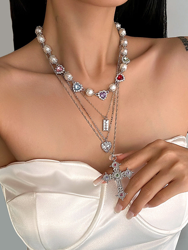 Collier superposé à pompons