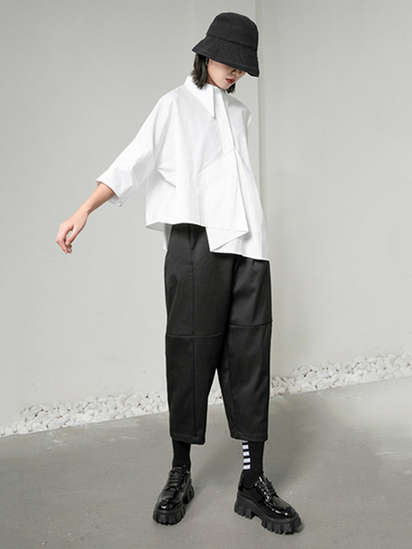 Blouse unie à coupe irrégulière et col revers