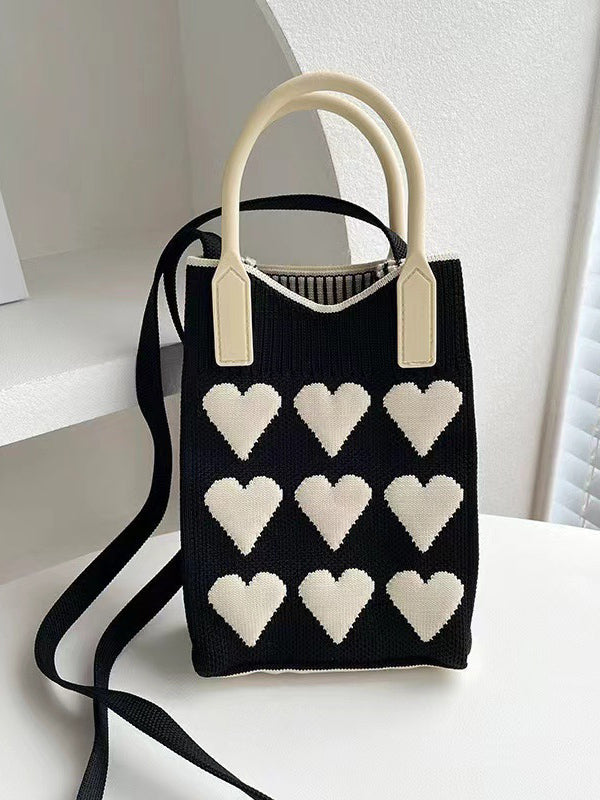 Sac à main à imprimé cœurs, à empiècements