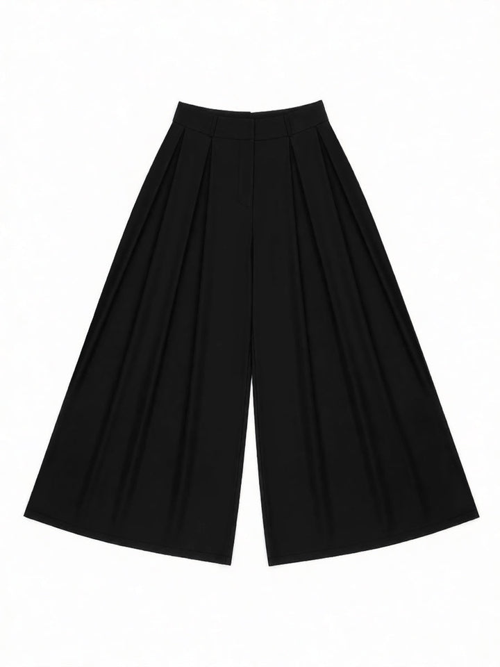 Pantalon élégant ample taille haute, à jambes larges, couleur unie