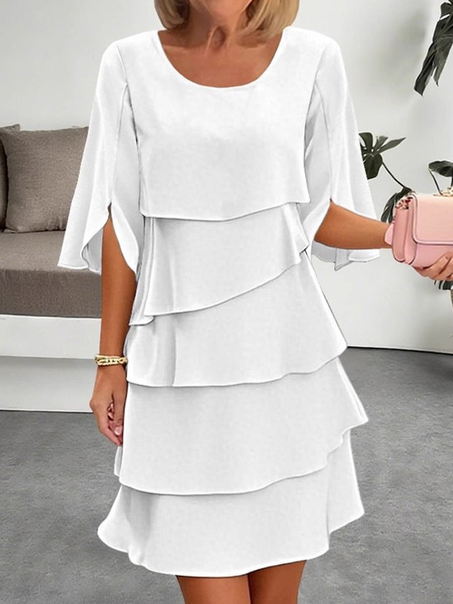 Robe courte ample superposée volantée à manches mi-longues, à empiècements, à col rond, couleur unie