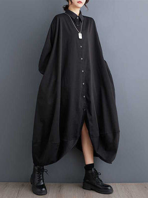 Robe chemise boutonnée coupe trapèze, à manches longues, à poches, à empiècements, à col revers, couleur unie