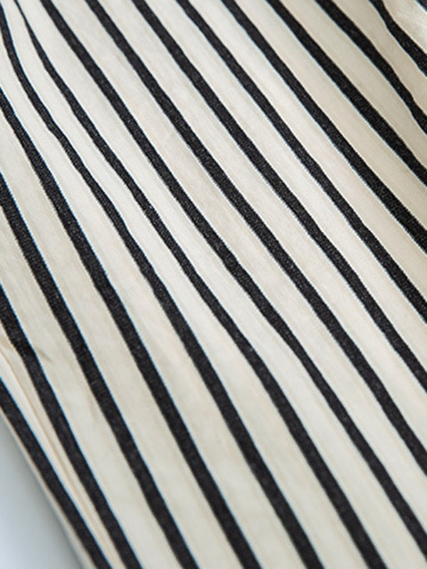 Pantalon ample rayé taille haute, à empiècements