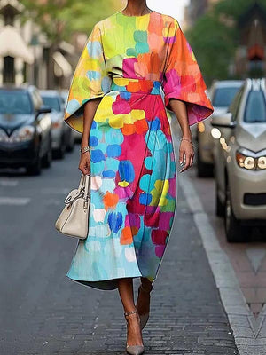 Robe mi-longue ample asymétrique à empiècements, à taille nouée, à col rond