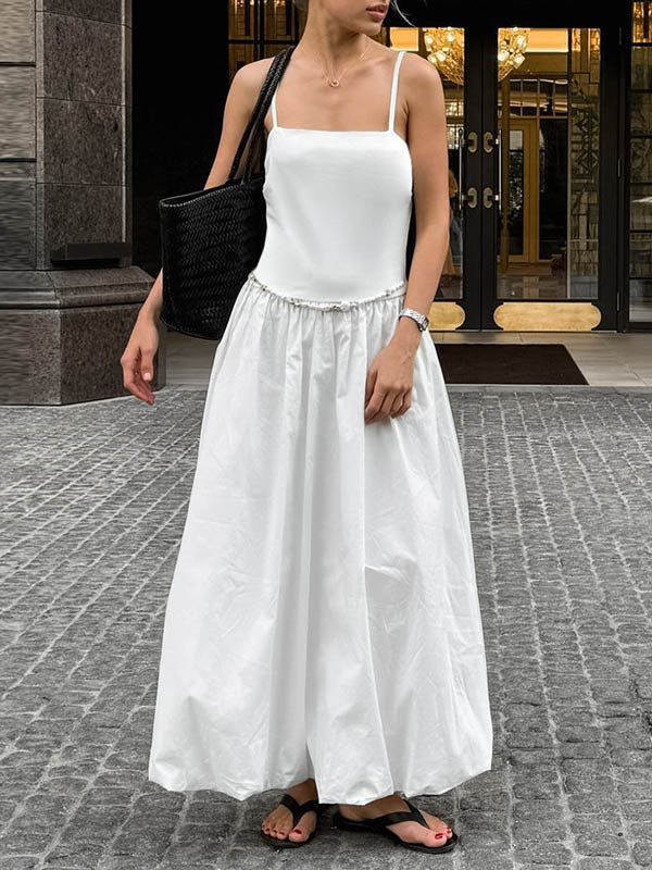 Robe mi-longue ample plissée sans manches, à empiècements, à fines bretelles, couleur unie