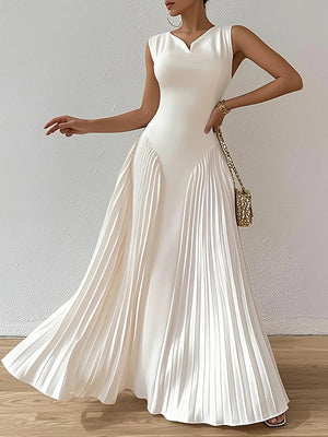 Robe longue ample plissée coupe trapèze, à col en V, couleur unie
