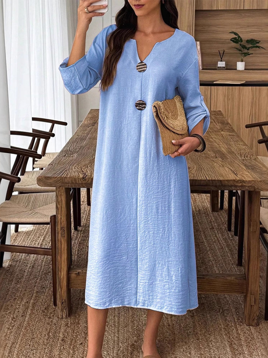 Robe mi-longue ample boutonnée à manches longues, à col en V, couleur unie