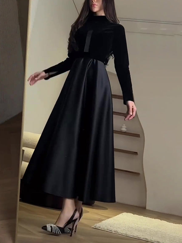 Robe longue plissée coupe trapèze, à manches longues, à empiècements, à fermeture éclair, à col cheminée
