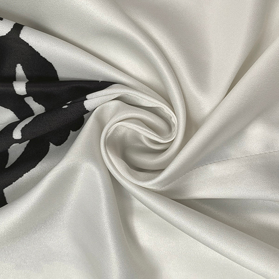 Robe mi-longue imprimée à manches mi-longues, à imprimé floral, à taille nouée, à col en V