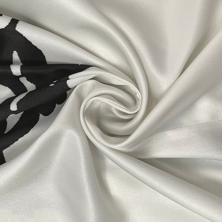 Robe mi-longue imprimée à manches mi-longues, à imprimé floral, à taille nouée, à col en V
