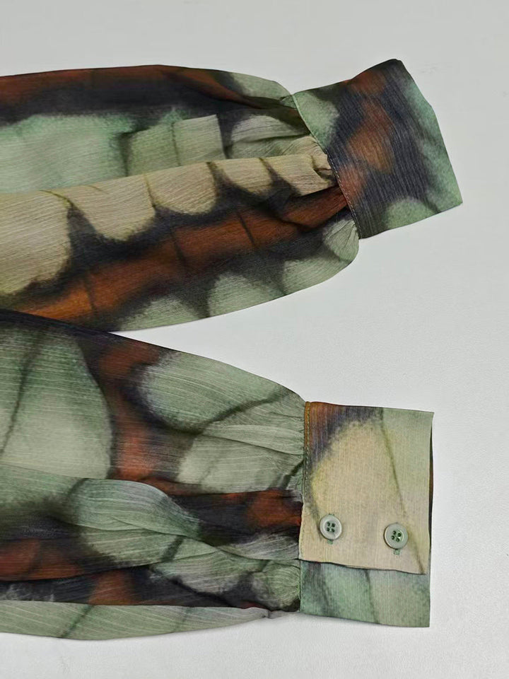 Manches ballon, manches longues, grand ourlet, couleur contrastée, imprimé plissé, fermeture éclair, col montant, robes longues