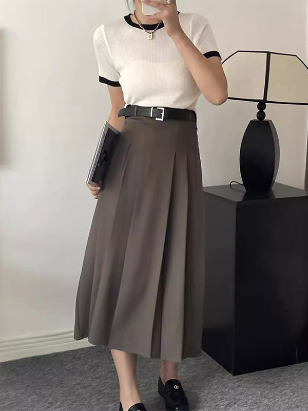 Jupe plissée coupe trapèze, taille haute, à empiècements, couleur unie