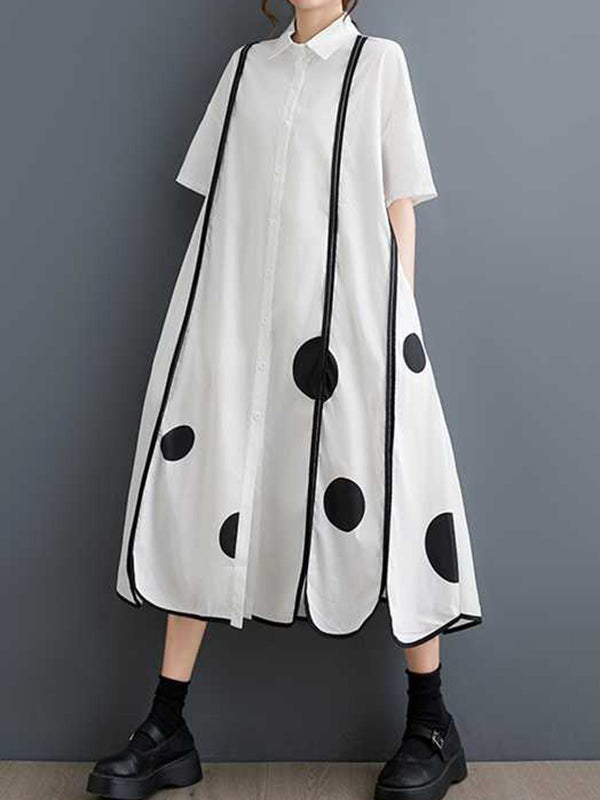 Robe chemise boutonnée fendue devant coupe trapèze, à manches mi-longues, à poches, à pois, à empiècements, à col revers