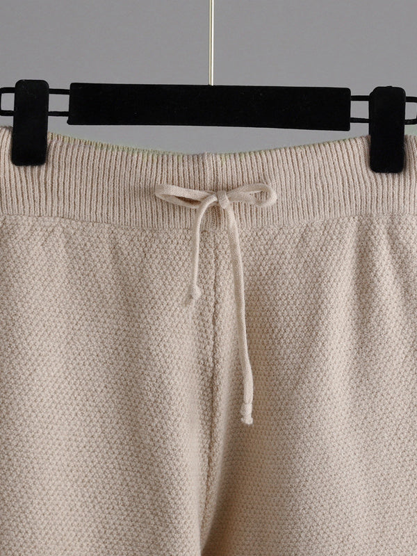 Pantalon urbain ample à manches longues, à col rond, à ourlet plongeant, à jambes larges, couleur unie