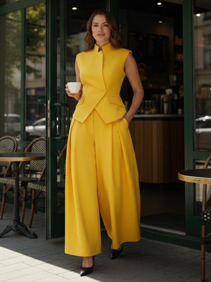 Pantalon ample plissé taille haute, à empiècements, couleur unie