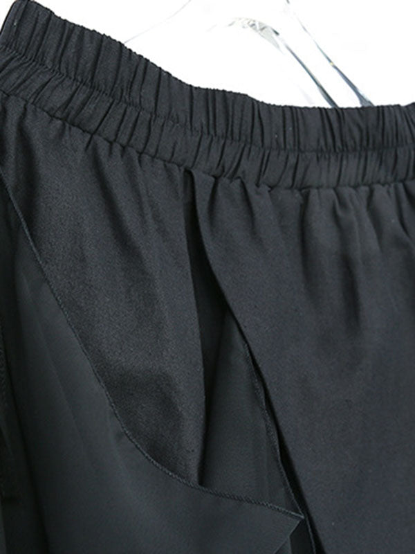 Pantalon 7/8 ample plissé couleur unie