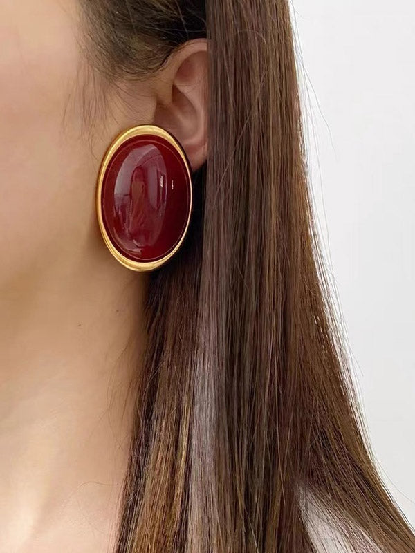 Boucles d'oreilles géométriques à empiècements
