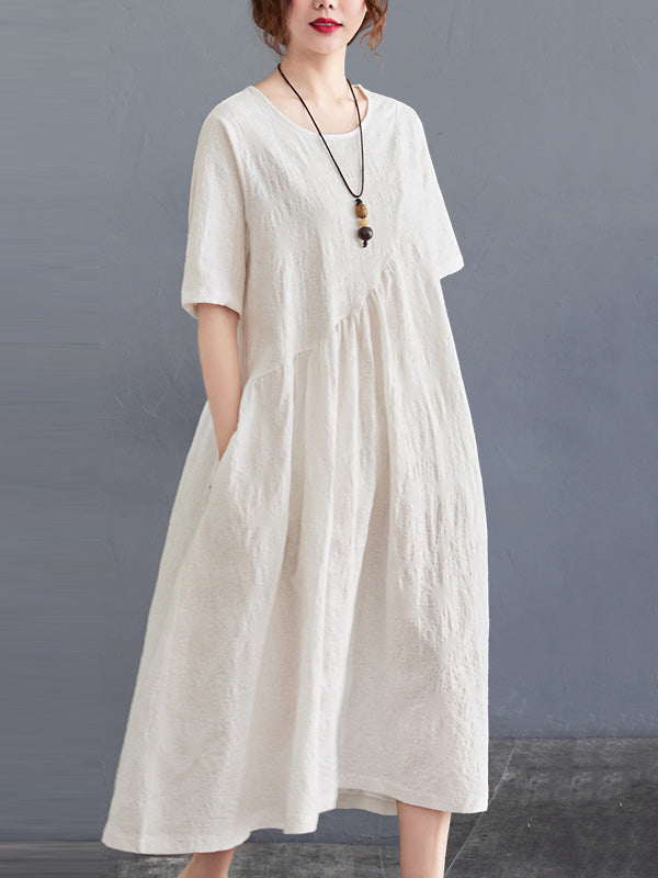 Robe irrégulière de couleur unie en mélange de coton