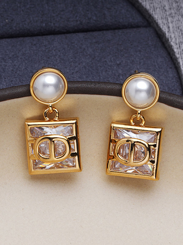 Boucles d'oreilles géométriques couleur contrastée
