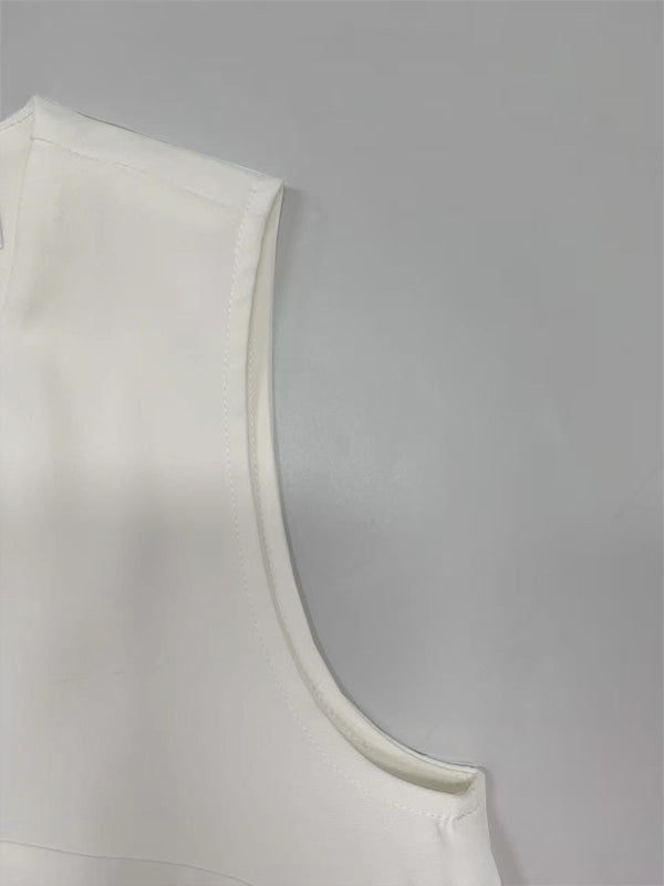Robe longue ample sans manches, à poches, à empiècements, à col rond, couleur unie