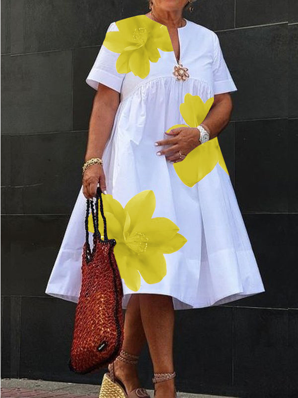 Robe mi-longue ample plissée coupe trapèze, à imprimé floral, à col en V