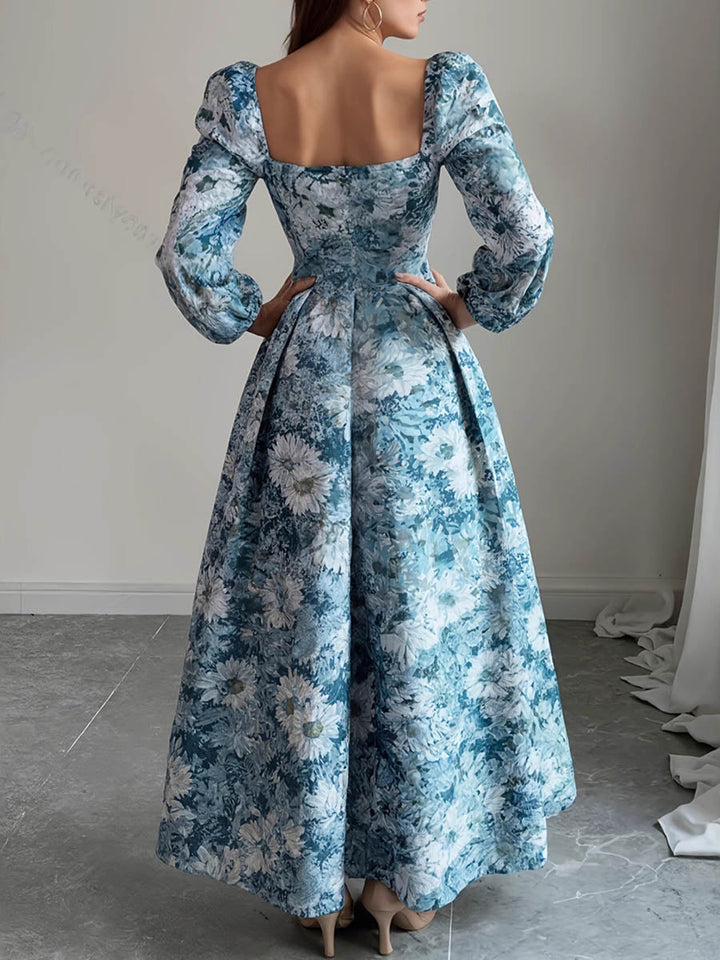 Robe longue plissée coupe trapèze, taille haute, à imprimé floral, à empiècements, à col carré, couleur contrastée