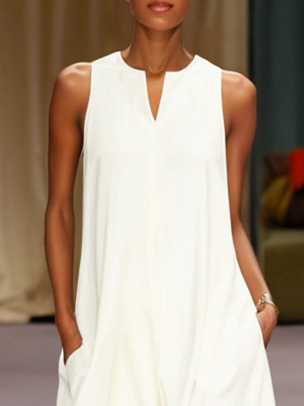 Robe longue ample sans manches, à empiècements, à col rond, couleur unie