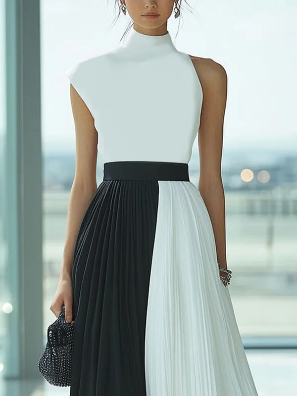 Robe longue ample plissée taille haute, à col cheminée, couleur contrastée
