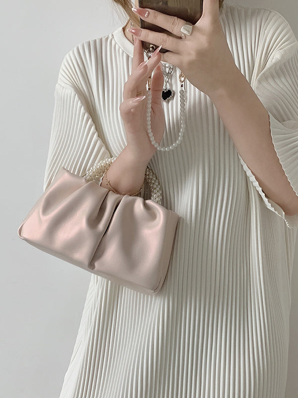Sac à main perlé à empiècements