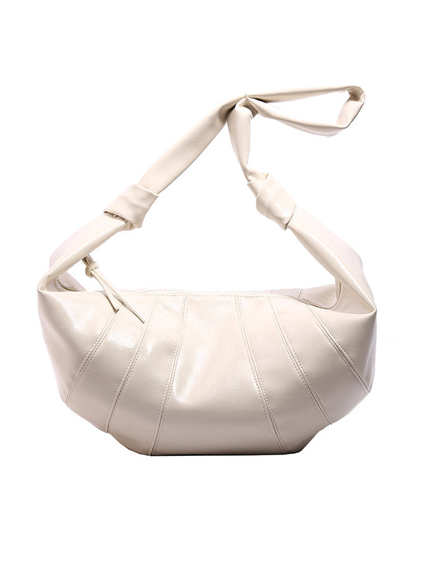 Sac bandoulière géométrique à empiècements, à fermeture éclair